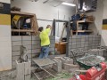 construction worker building an interior wall