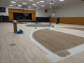 interior gymnasium floor prepped for refinishing